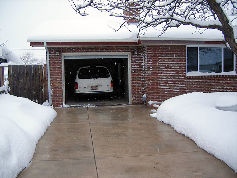 Radiant heated driveway after a snowstorm.